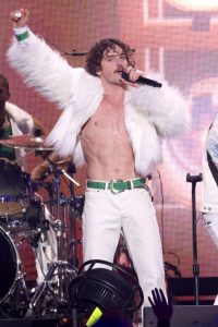 Benson Boone performing on stage