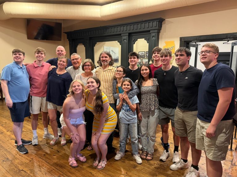 a group of people posing for a photo